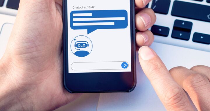 User holding a mobile phone with an AI chatbot
